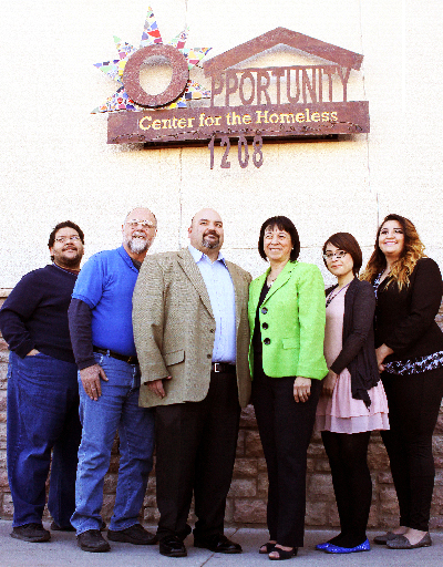 From left, Hector Rosales, Daniel Vasquez and Raymond Tullius from the Opportunity Center for the Homeless join UTEP Assistant Professor Eva Moya and graduate students Jacqueline Loweree and Courtney Adcox at the center in downtown El Paso. The Opportunity Center and the UTEP Department of Social Work will host the second State of the Homeless Conference on Feb. 27, which also will feature a photo exhibit on “The Faces of Homelessness.” Photo by Laura Trejo / UTEP News Service