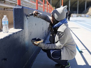 Student-athletes and staff for the UTEP track and field team volunteer to clean out the storage area and paint parts of Kidd Field during Project MOVE, the annual day of community service in El Paso on Saturday, February 28, 2015. Photo by Ivan Pierre Aguirre/UTEP Communications